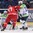 OSTRAVA, CZECH REPUBLIC - MAY 2: Slovenia's Robert Kristan #33 follows a loose puck with Belarus' Alexander Kitarov #77 and Slovenia's Ales Kranjc #28 in front during preliminary round action at the 2015 IIHF Ice Hockey World Championship. (Photo by Richard Wolowicz/HHOF-IIHF Images)

